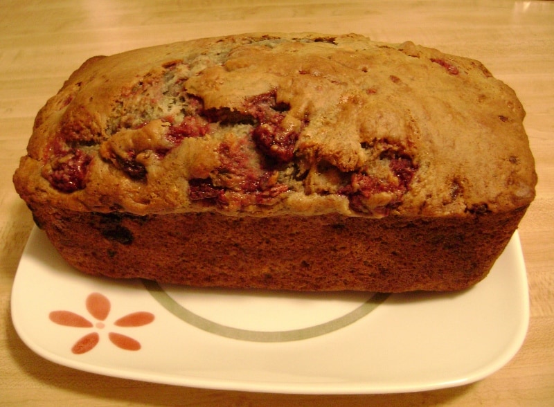 a loaf of banana-raspberry bread
