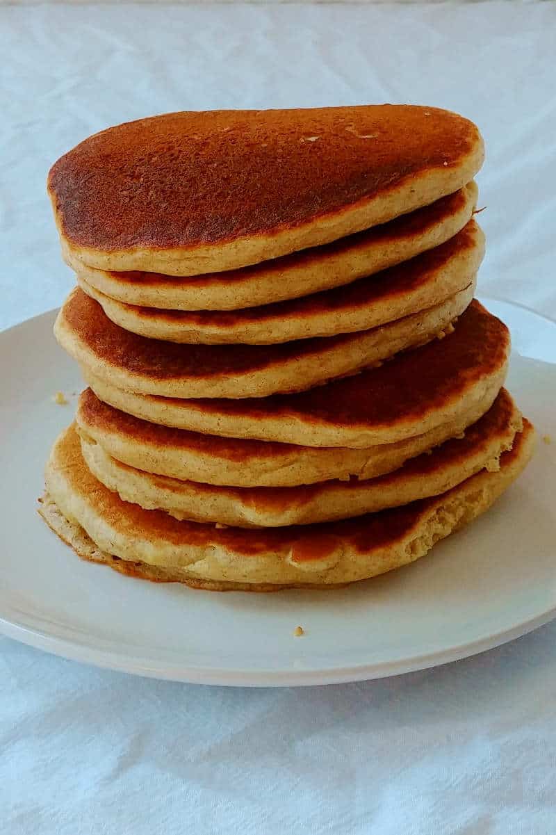 a tall stack of 8 easy pancakes, on a plate