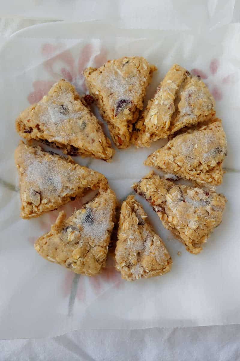 dough for cranberry oat pecan scones, cut into wedges