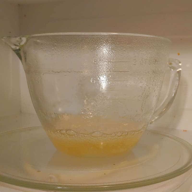 corn syrup and sugar after being microwaved in a large glass measuring bowl, for microwave peanut brittle