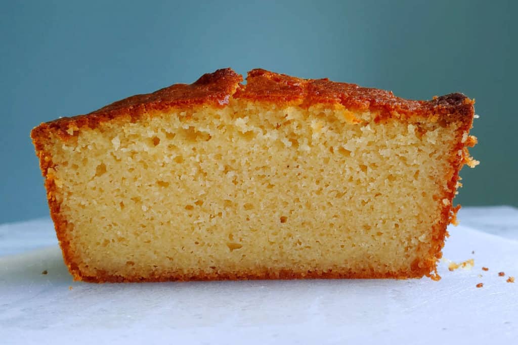 a slice of ricotta pound cake, seen from the side