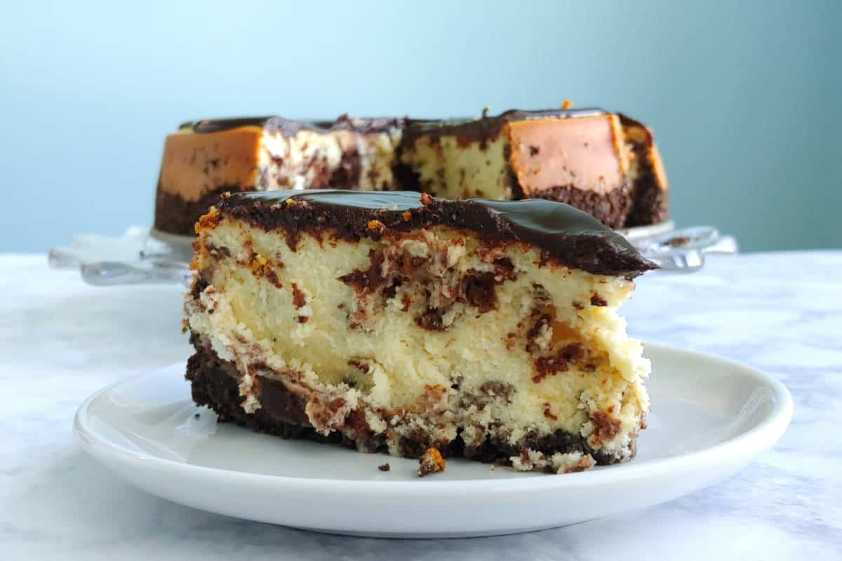 slice of cheesecake in front of the whole
